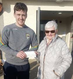 Senior Footballer Eoin Sloan received his £1,000 winnings from the first monthly Down Draw from Club Coordinator Anne McArdle. 
